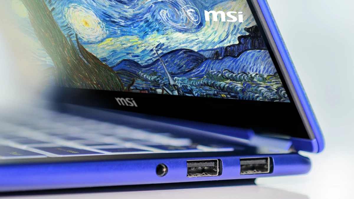 Trên tay MSI Prestige 14 Flip AI+ Van Gogh Edition với jack âm thanh 3.5 mm và hai cổng USB-A
