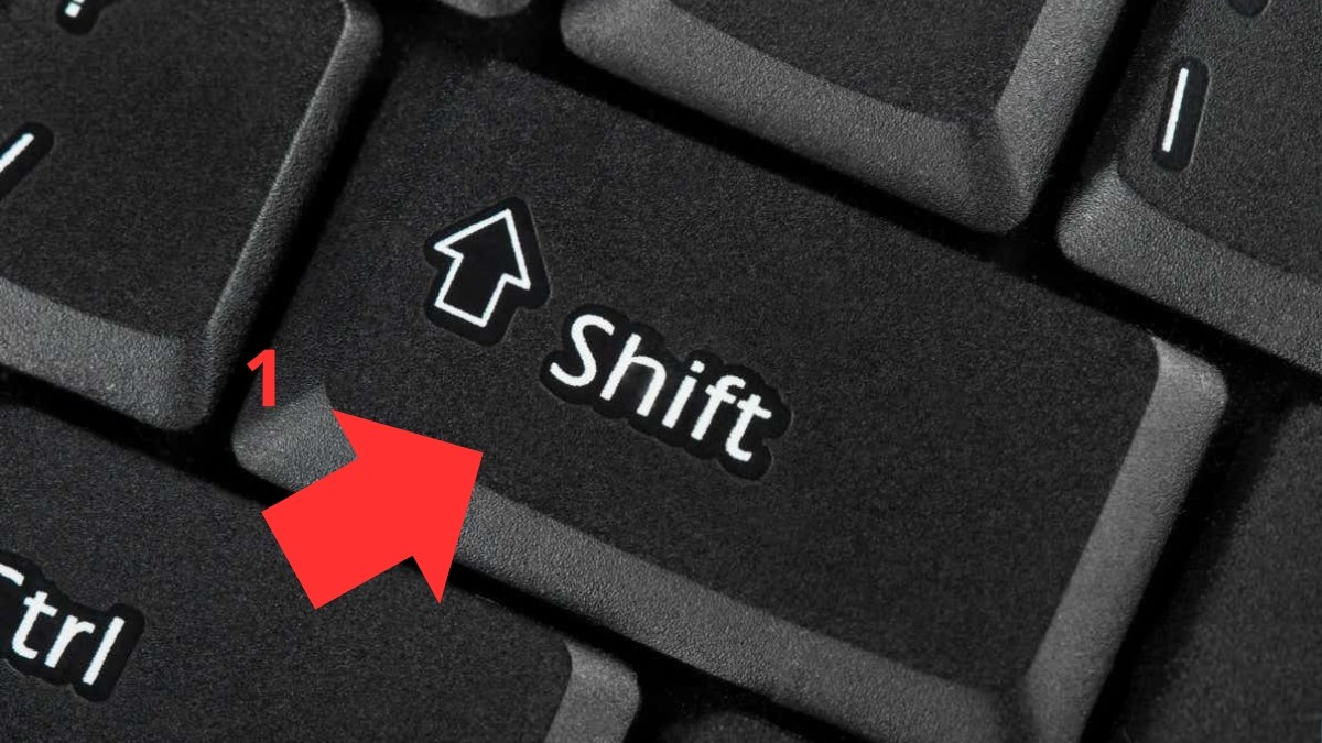 Giữ phím Shift phải cùng lúc