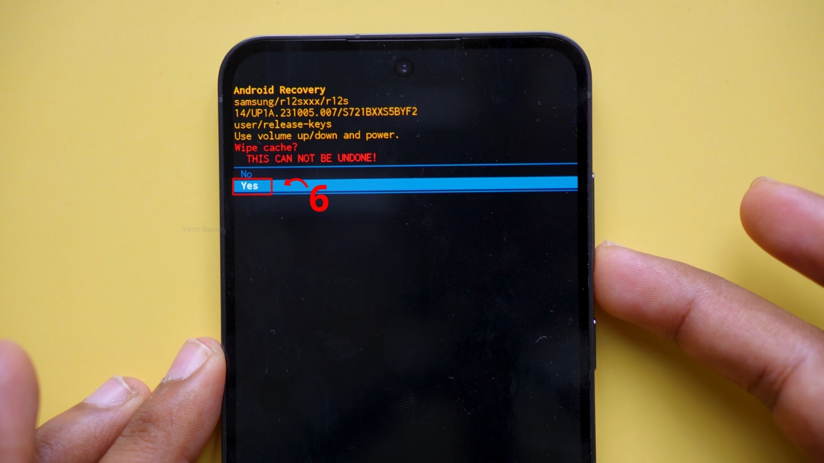 Dùng nút Giảm âm lượng di chuyển đến Yes