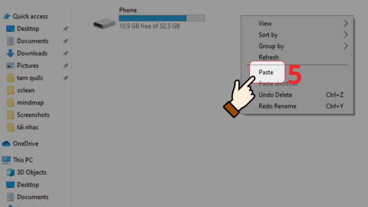 Dán file nhạc vào thẻ nhớ giúp hoàn tất cách tải nhạc trên Nokia cục gạch.