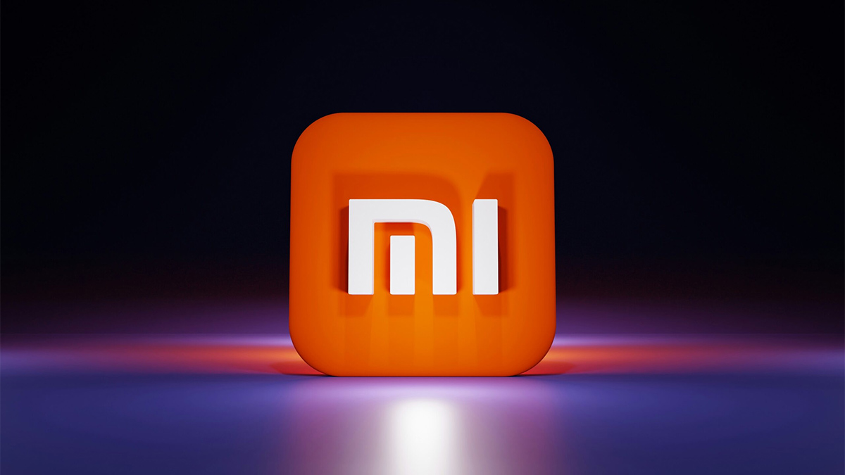 Logo 3D màu cam và trắng của Xiaomi, giải thích ý nghĩa xiaomi nghĩa là gì.