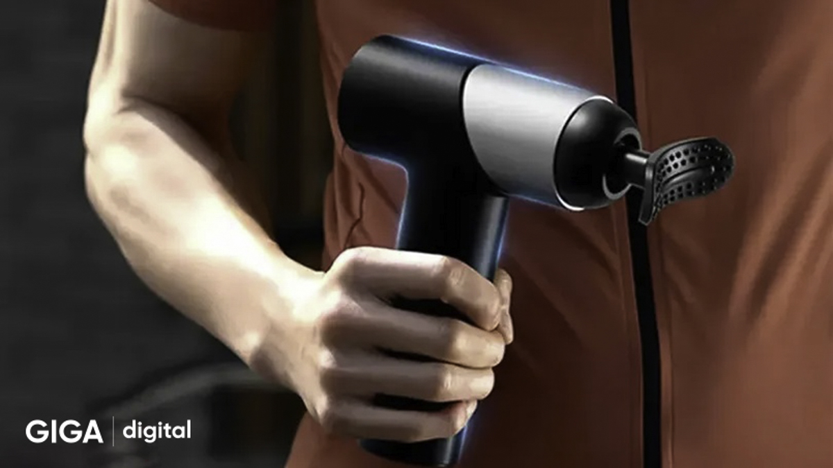 Súng Massage Fascial Gun Philips PPM7323 giúp tự massage vùng lưng hoặc bả vai không cần người hỗ trợ