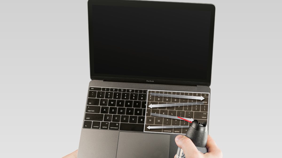 Vệ sinh bàn phím MacBook bằng bình xịt khí nén
