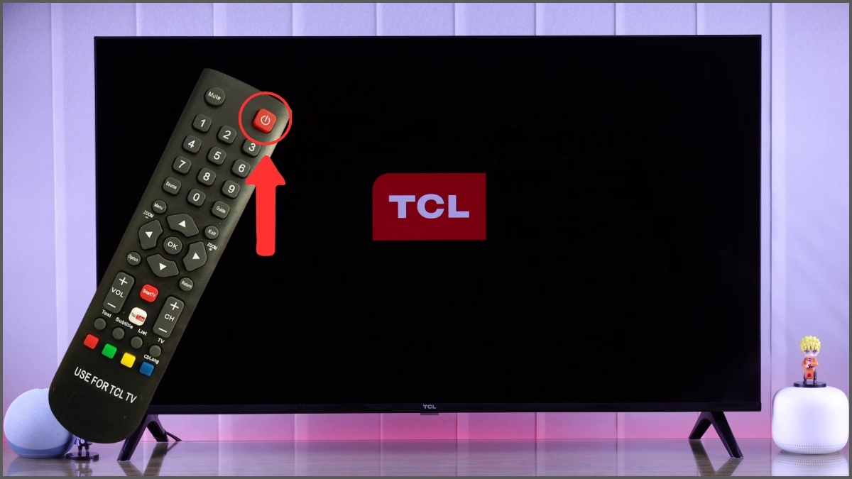 Nhấn nút nguồn trên remote để bật tivi