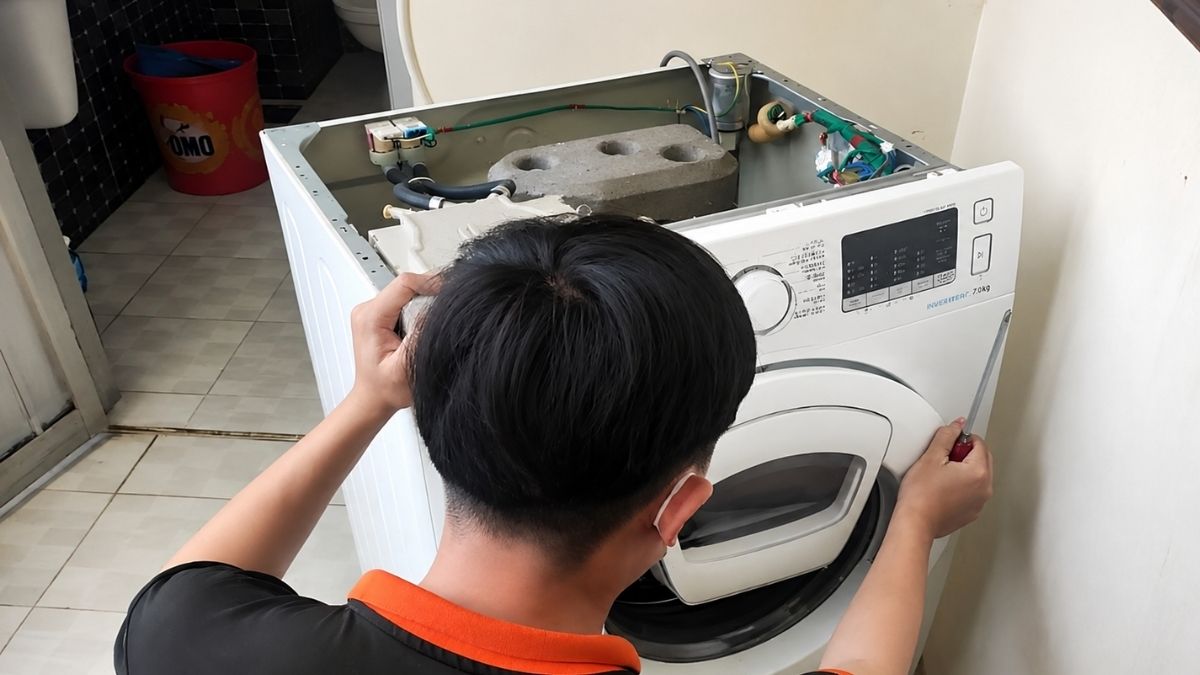 Tháo nắp thùng máy giặt