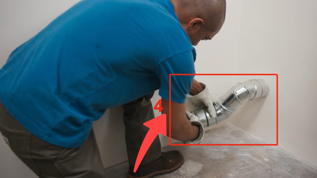 Luồn ống mềm qua lỗ đã khoan để đưa đường ống thoát khí ra ngoài