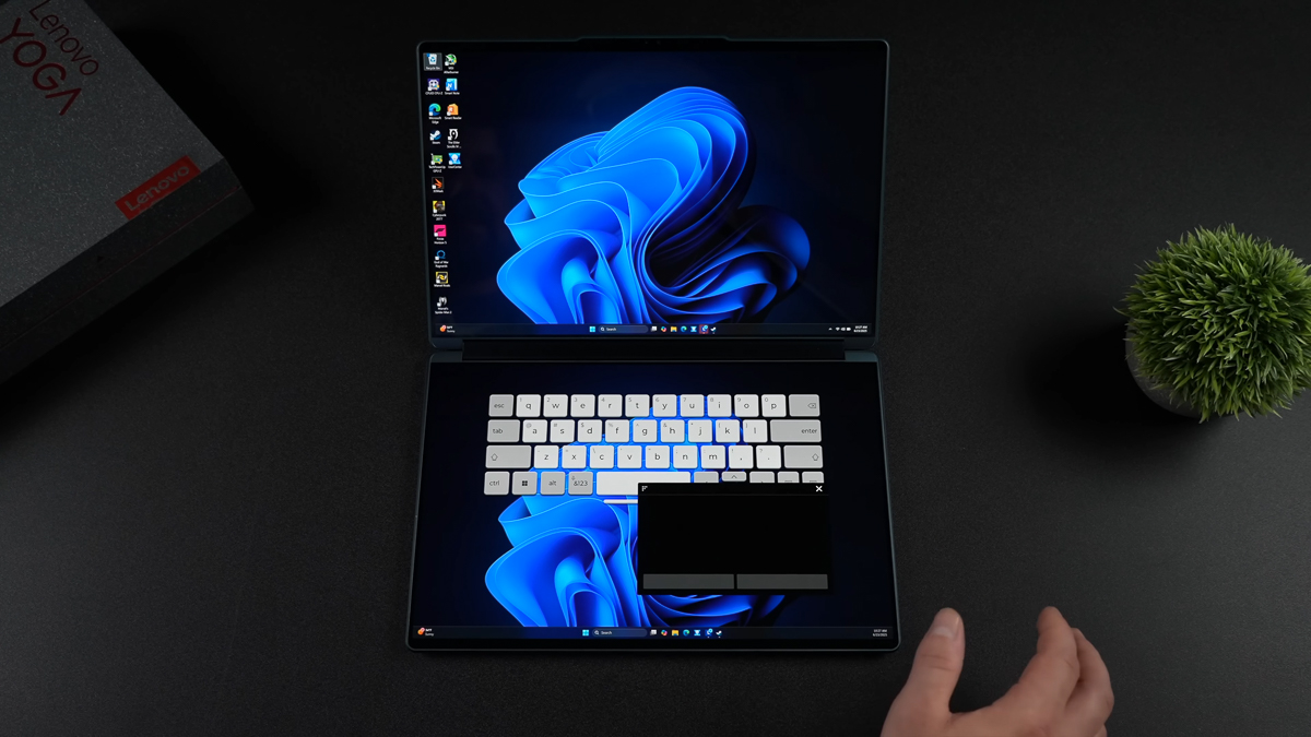 Lenovo Yoga Book 9i Gen 10 cũng có thể cung cấp cho bạn một bộ bàn phím và touchpad ảo