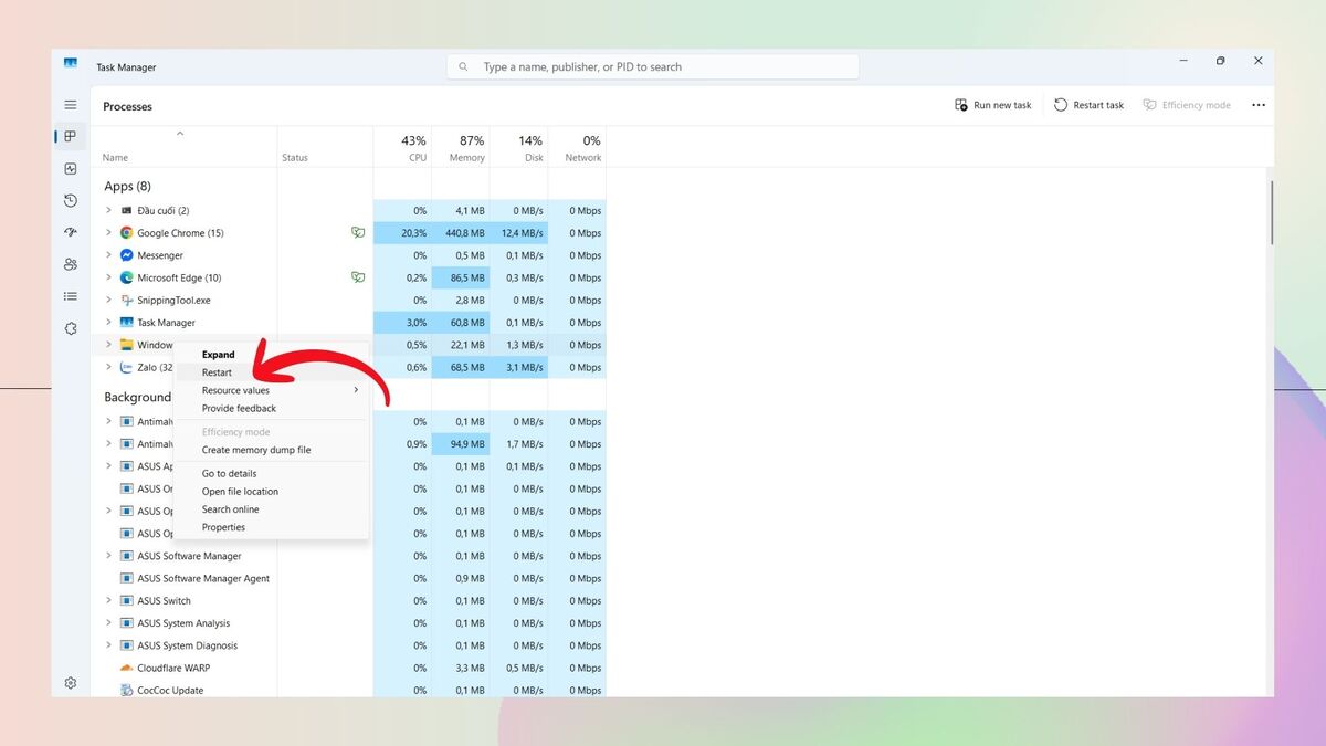 Khởi động lại máy trong phần Task Manager