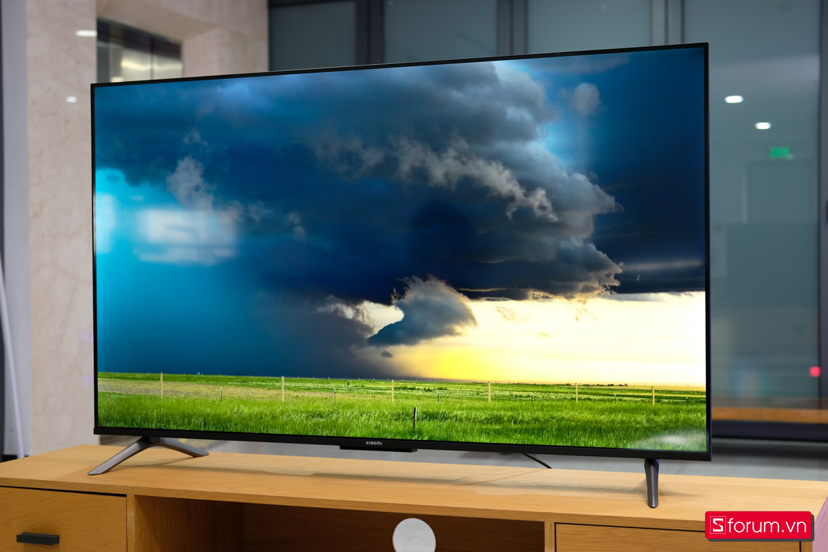 Có 15 triệu nên mua TV 65 inch hay máy chiếu