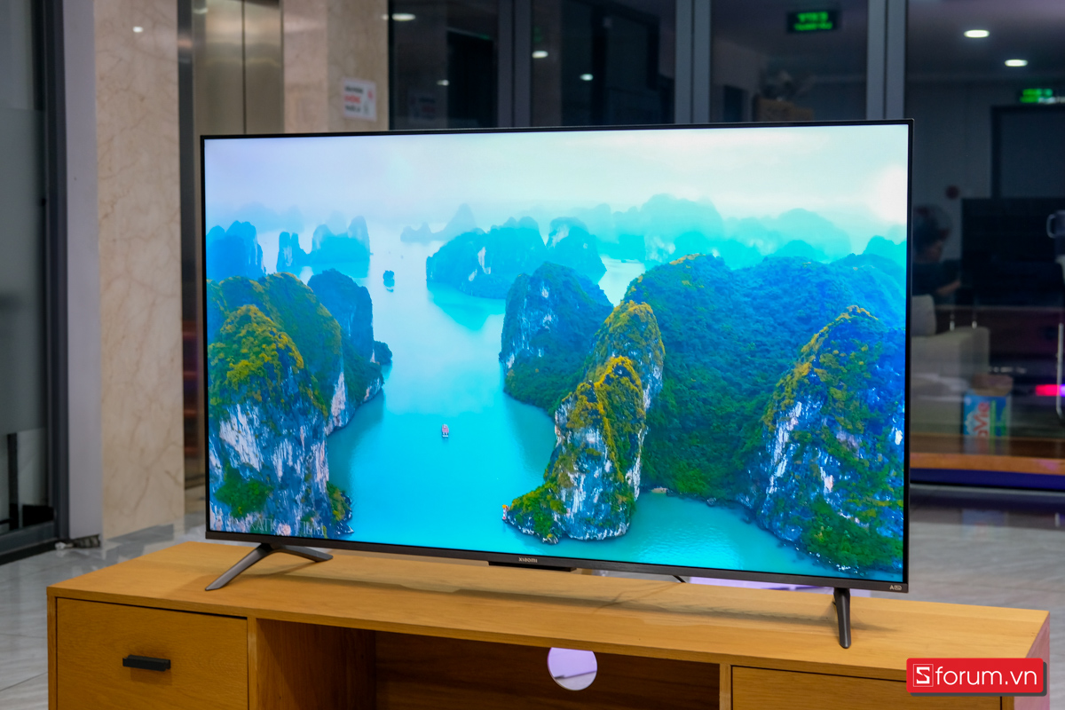 Có 15 triệu nên mua TV 65 inch hay máy chiếu