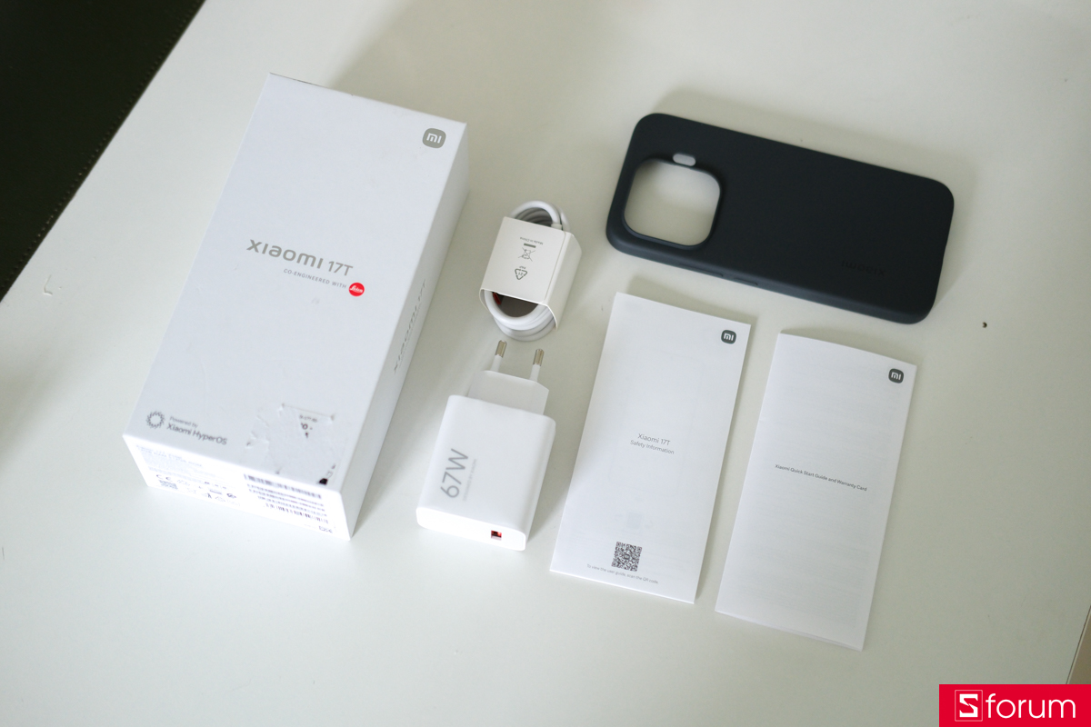 rọn bộ phụ kiện đi kèm bên trong hộp của Xiaomi 17T bao gồm cáp, sạc và ốp lưng