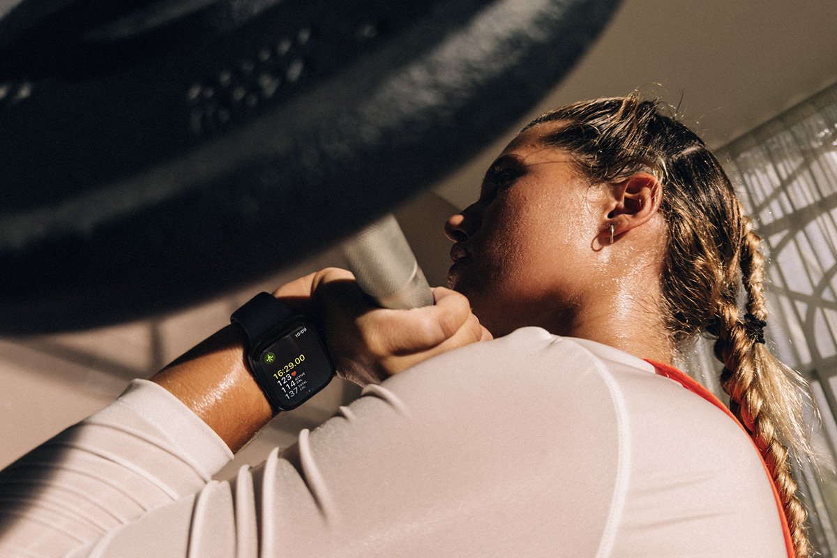 An Apple Watch Series 12 user is shown doing strength training.